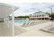 Resort-style community pool with lounge chairs and clubhouse for residents at 3009 Gentle Breezes Ln, Raleigh, NC 27614