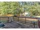 View from home's wooden deck showing space for outdoor seating and lawn at 3009 Gentle Breezes Ln, Raleigh, NC 27614