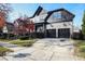 Beautifully landscaped home featuring a two-car garage and a well-maintained front yard with mature trees at 3009 Gentle Breezes Ln, Raleigh, NC 27614