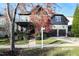 Charming two-story home with a well-manicured lawn and a two-car garage in a desirable neighborhood at 3009 Gentle Breezes Ln, Raleigh, NC 27614