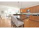 Kitchen area with granite island and dining area at 3009 Gentle Breezes Ln, Raleigh, NC 27614