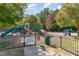 Gated community playground with multiple slides and play equipment for to enjoy at 3009 Gentle Breezes Ln, Raleigh, NC 27614