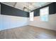 Formal dining room features hardwood floors and a stylish chandelier at 373 Abingdon Farms Dr, Selma, NC 27576