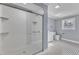 Bathroom with a walk-in shower and patterned tile floor at 505 S Magnolia Ave, Dunn, NC 28334