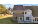 Rear view of townhome showing patio and yard at 804 Pryor St # 49, Mebane, NC 27302
