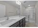 Bathroom with double vanity, shower, and toilet at 804 Pryor St # 49, Mebane, NC 27302