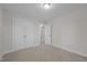 Bedroom with double doors and carpet flooring at 804 Pryor St # 49, Mebane, NC 27302