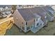 Two-story townhome with backyard patio and neutral siding at 804 Pryor St # 49, Mebane, NC 27302