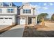 Two-story townhome with attached garage and landscaping at 804 Pryor St # 49, Mebane, NC 27302