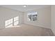 Simple bedroom with a window and carpet at 806 Pryor St # 50, Mebane, NC 27302