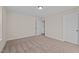 Simple bedroom with carpet and neutral walls at 806 Pryor St # 50, Mebane, NC 27302