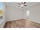 Bright bedroom with a view and wood-look floors at 806 Pryor St # 50, Mebane, NC 27302