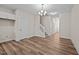 Bright dining room with hardwood floors and a chandelier at 806 Pryor St # 50, Mebane, NC 27302