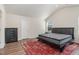 Spacious bedroom with a queen-size bed and a dresser at 224 Brisk Dr, Zebulon, NC 27597