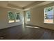 Spacious main bedroom with tray ceiling and large windows with ample natural light at 236 Alden Way, Angier, NC 27501