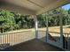 View from screened in patio showcasing beautiful wooded backyard at 236 Alden Way, Angier, NC 27501