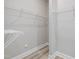 Walk-in closet featuring built-in shelves and neutral walls and floors at 236 Alden Way, Angier, NC 27501