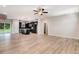 Bright and airy living room boasts modern lighting, open space, and flows into the kitchen at 6965 Us-401, Fuquay Varina, NC 27526