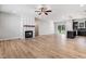 Spacious living room features a modern fireplace, contemporary floors, and ample natural light at 6965 Us-401, Fuquay Varina, NC 27526