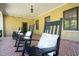 Charming covered porch with rocking chairs, providing a comfortable and inviting outdoor space at 1015 Minerva Ave, Durham, NC 27701