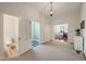 Open foyer showcasing doors to a powder room, basement, and view into the dining room at 1015 Minerva Ave, Durham, NC 27701