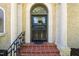 Elegant front door with a decorative arched window and classic architectural details at 1015 Minerva Ave, Durham, NC 27701