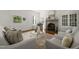 Inviting living room features a fireplace, ample natural light, and comfortable seating at 1015 Minerva Ave, Durham, NC 27701