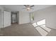 Spacious bedroom with ample natural light, neutral walls, and plush carpet flooring at 15 Diamond Creek Dr, Zebulon, NC 27597