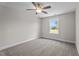 Bright bedroom featuring neutral walls, carpeted floors and a window with serene views at 15 Diamond Creek Dr, Zebulon, NC 27597