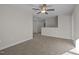 Spacious bonus room features neutral carpet and white walls, ready for customization into a functional living space at 15 Diamond Creek Dr, Zebulon, NC 27597