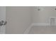 Laundry room has tile flooring, light gray walls, and hookups for a washer and dryer at 15 Diamond Creek Dr, Zebulon, NC 27597