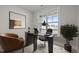 Bright home office featuring a large window overlooking houses under construction at 15 Diamond Creek Dr, Zebulon, NC 27597