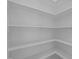 Large corner pantry with ample shelving for storage at 15 Diamond Creek Dr, Zebulon, NC 27597