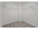 Empty walk-in closet with wire shelves ready to store plenty of clothes and accessories at 15 Diamond Creek Dr, Zebulon, NC 27597