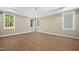 Spacious bedroom featuring a ceiling fan, ample natural light, and hardwood flooring at 205 Purslane Dr, Franklinton, NC 27525