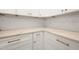 Close-up of kitchen cabinetry with white subway tile backsplash and quartz countertops at 205 Purslane Dr, Franklinton, NC 27525