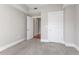 Bedroom with neutral carpet and closets at 222 Glenwood Ave # 508, Raleigh, NC 27603