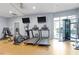 Modern gym featuring treadmills, elliptical machines, and fitness equipment for residents at 222 Glenwood Ave # 508, Raleigh, NC 27603