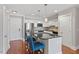 Lovely open kitchen featuring a center island, modern appliances, and ample lighting at 222 Glenwood Ave # 508, Raleigh, NC 27603