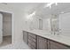 Spacious bathroom with double vanity, plenty of storage, and a glass door shower at 35 Diamond Creek Dr, Zebulon, NC 27597