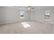 Expansive bedroom features natural light and neutral carpeting at 35 Diamond Creek Dr, Zebulon, NC 27597