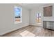 Bright and airy kitchen with stainless steel appliances and an easy access door to the backyard at 35 Diamond Creek Dr, Zebulon, NC 27597