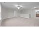 Open landing with plush carpet, neutral color, and doorways leading to other rooms at 35 Diamond Creek Dr, Zebulon, NC 27597