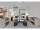 Bright living room offers neutral walls, modern furnishings, a ceiling fan, and a stylish rug at 35 Diamond Creek Dr, Zebulon, NC 27597