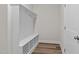 Mud room with bench, storage and hardwood floors at 35 Diamond Creek Dr, Zebulon, NC 27597
