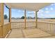 Back porch with wood railing and ceiling at 35 Diamond Creek Dr, Zebulon, NC 27597