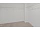 Walk-in closet with wire shelving and neutral carpet at 35 Diamond Creek Dr, Zebulon, NC 27597