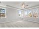 Bright bedroom with tray ceiling, carpet and lots of natural light at 9148 Dupree Meadow Dr # 11, Angier, NC 27501