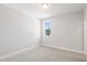 Cozy bedroom featuring neutral carpet, and a window offering natural light at 9148 Dupree Meadow Dr # 11, Angier, NC 27501