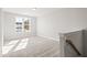 Upstairs bedroom with natural light and neutral carpet at 9148 Dupree Meadow Dr # 11, Angier, NC 27501